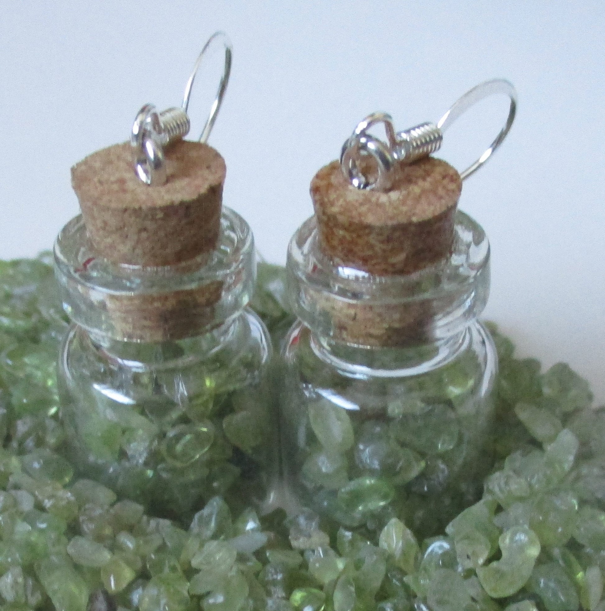 glass fairy bottle potion vial peridot chips earrings